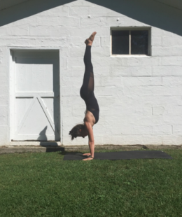 Image of yoga handstand Yogamaya