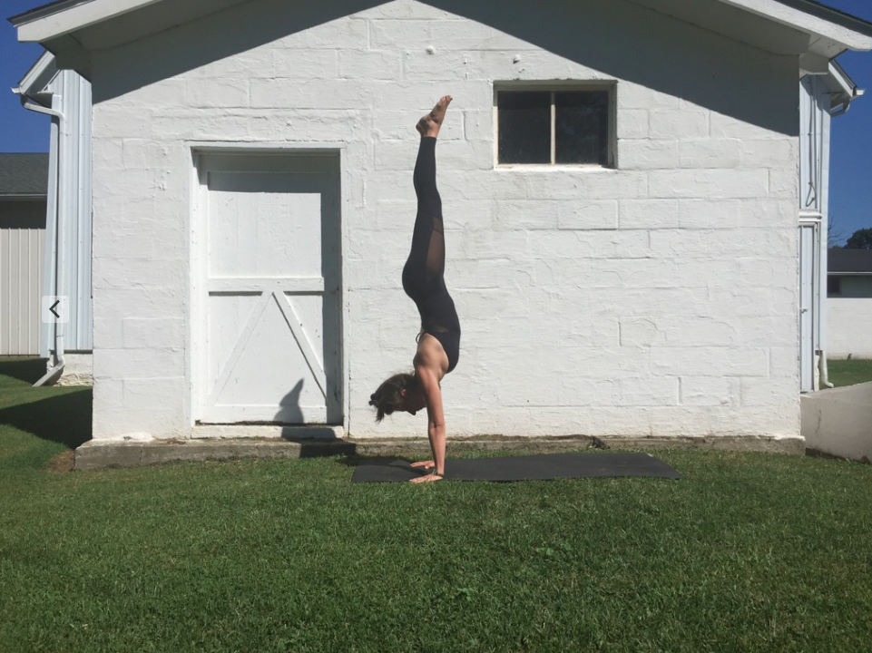 Image of yoga handstand Yogamaya
