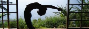 Outdoor yoga pose from Yogamaya
