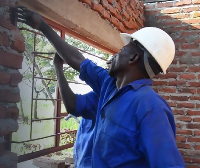 men working on a building