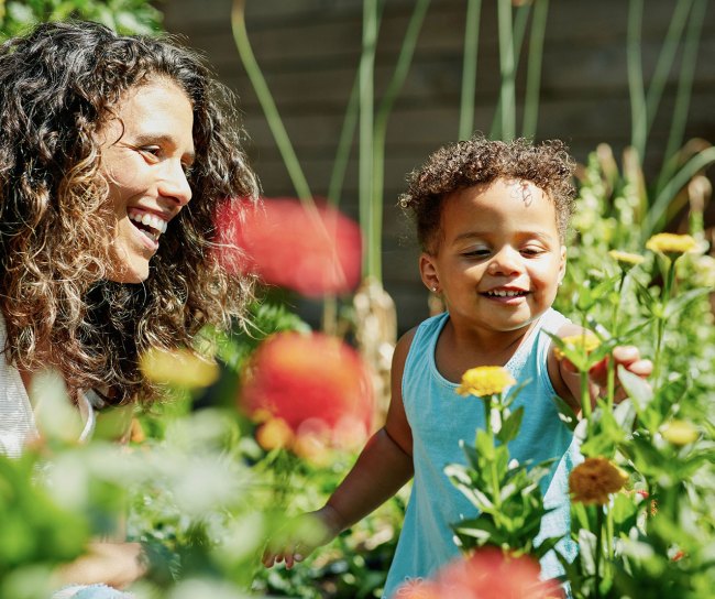 mother and child having fun in the garden